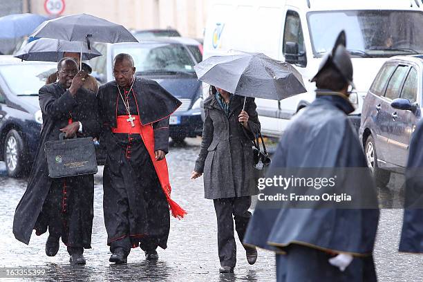 Archbishop of Kinshasa Laurent Monsengwo Pasinya and a collegue from Africa leave the Paul VI Hall at the end of the seventh general congregation on...