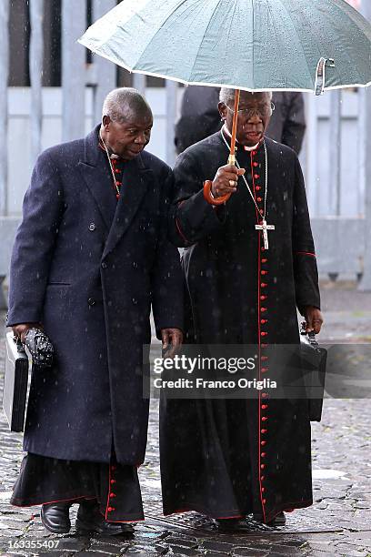 Nigerian Cardinal Francis Arinze leaves the Paul VI Hall at the end of the seventh general congregation on March 8, 2013 in Vatican City, Vatican....