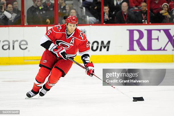 Tim Gleason of the Carolina Hurricanes against the Buffalo Sabres during play at PNC Arena on March 5, 2013 in Raleigh, North Carolina.