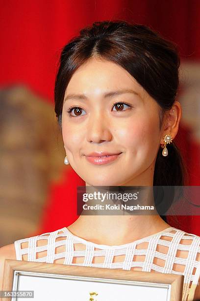 Actress Yuko Oshima poses during the 36th Japan Academy Prize Award Ceremony at Grand Prince Hotel Shin Takanawa on March 8, 2013 in Tokyo, Japan.