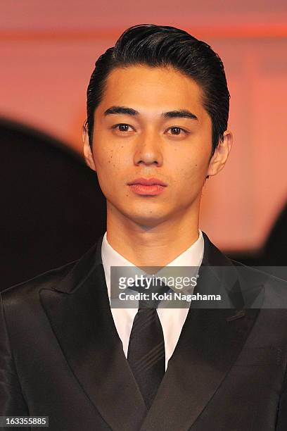 Actor Masahiro Higashide poses during the 36th Japan Academy Prize Award Ceremony at Grand Prince Hotel Shin Takanawa on March 8, 2013 in Tokyo,...