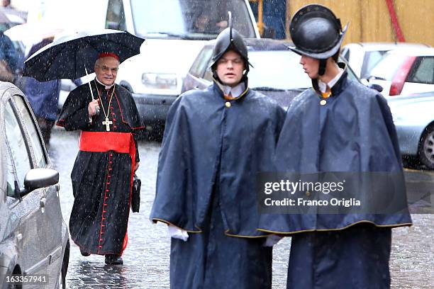 Portuguese cardinal Saraiva Martins leaves the Paul VI Hall at the end of the seventh general congregation on March 8, 2013 in Vatican City, Vatican....