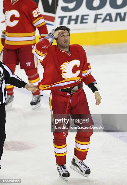 Brian McGrattan of the Calgary Flames celebrates after fighting Tom Sestito of the Vancouver Canucks during their NHL game at the Scotiabank...