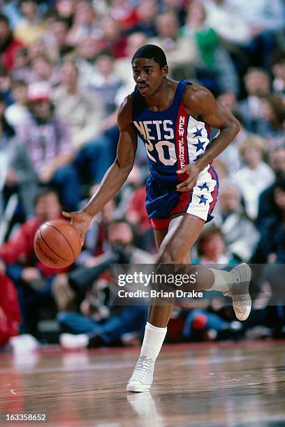 Micheal Ray Richardson of the New Jersey Nets dribbles the ball against the Portland Trail Blazers during a game played in 1986 at the Veterans...