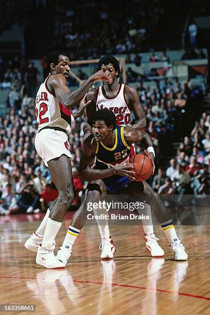 Dunn of the Denver Nuggets dribbles the ball against the Portland Trail Blazers during a game played in 1986 at the Veterans Memorial Coliseum in...