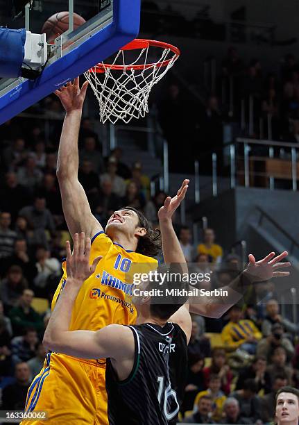 Kresimir Loncar, #10 of BC Khimki Moscow Region competes with Benjamin Ortner, #16 of Montepaschi Siena during the 2012-2013 Turkish Airlines...