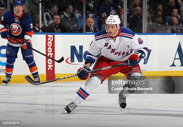 Stu Bickel of the New York Rangers skates against the New York Islanders at the Nassau Veterans Memorial Coliseum on March 7, 2013 in Uniondale, New...