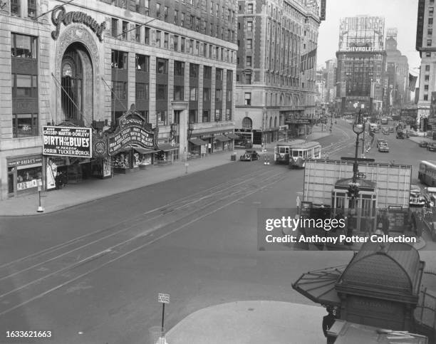 View from the Times Square-42nd Street subway station, looking north down a deserted 7th Avenue, with the Paramount Theatre on the left, during an...