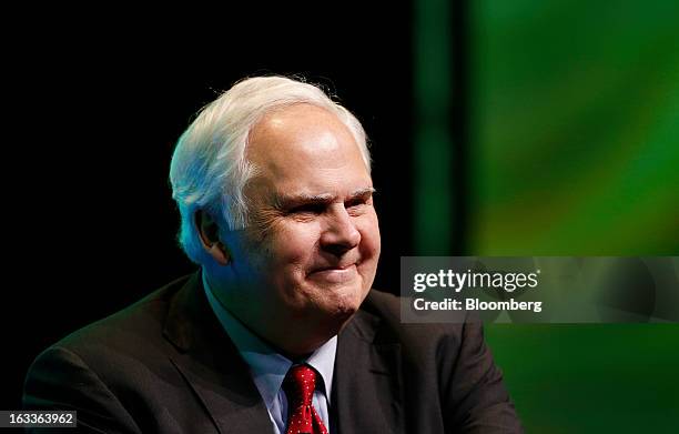 Frederick "Fred" Smith, president and chief executive officer of FedEx Corp., smiles during the 2013 IHS CERAWeek conference in Houston, Texas, U.S.,...