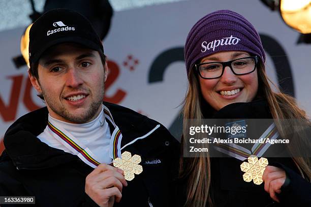 Chloe Dufour-Lapointe and Alex Bilodeau of Canada take 1st place during the FIS Freestyle Ski World Championship Men's and Women's Dual Moguls on...