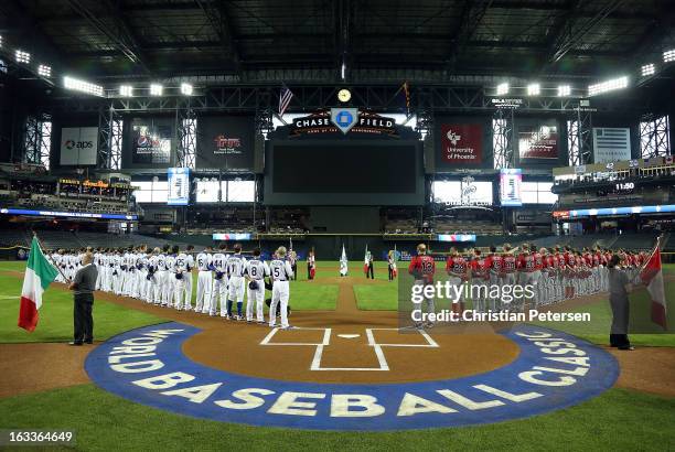 Players from Italy and Canada line up for the National Anthems before the World Baseball Classic First Round Group D game at Chase Field on March 8,...