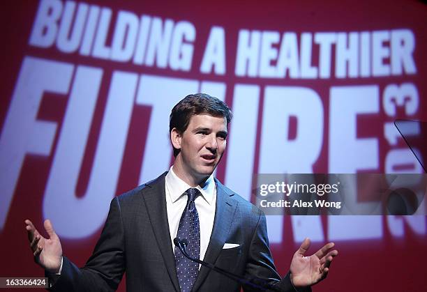 New York Giants quarterback Eli Manning speaks during the "Building a Healthier Future Summit" March 8, 2013 at the Lisner Auditorium of George...