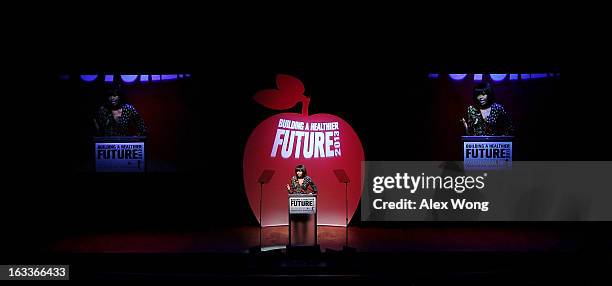 First lady Michelle Obama speaks during the "Building a Healthier Future Summit" March 8, 2013 at the Lisner Auditorium of George Washington...