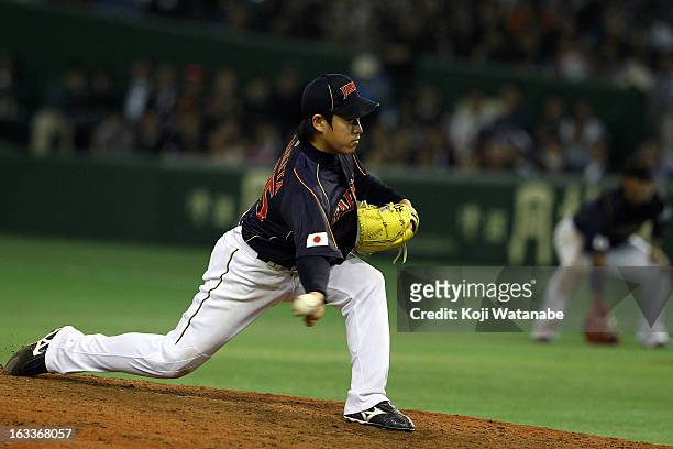 Pitcher Kazuhisa Makita of Japan pitches during the World Baseball Classic Second Round Pool 1 game between Japan and Chinese Taipei at Tokyo Dome on...