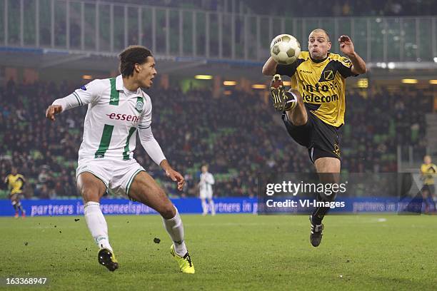 Virgil van Dijk of FC Groningen, Anthony Lurling of NAC Breda during the Dutch Eredivisie match between FC Groningen and NAC Breda at the Euroborg on...