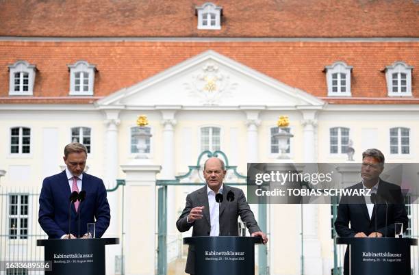 German Finance Minister Christian Lindner, German Chancellor Olaf Scholz and German Minister of Economics and Climate Protection Robert Habeck...