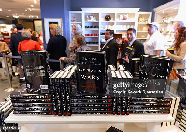 New book by former Florida governor Jeb Bush and Clint Bolick "Immigration Wars: Forging an American Solution" is displayed in the bookstore of the...