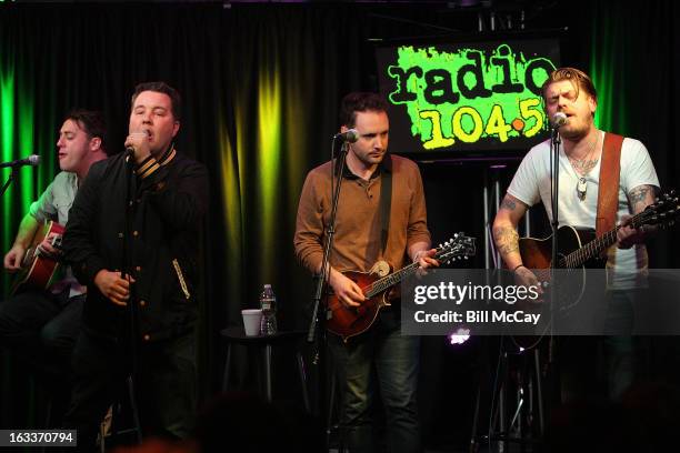 James Lynch, Ken Casey Tim Brennan and Jeff DaRosa of Dropkick Murphys perform at Radio Station Q102 iHeartRadio Performance Theater March 8, 2013 in...