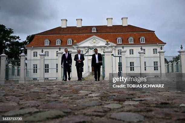 German Finance Minister Christian Lindner, German Chancellor Olaf Scholz and German Minister of Economics and Climate Protection Robert Habeck arrive...