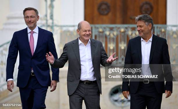 German Finance Minister Christian Lindner, German Chancellor Olaf Scholz and German Minister of Economics and Climate Protection Robert Habeck arrive...