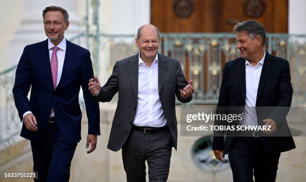 German Finance Minister Christian Lindner, German Chancellor Olaf Scholz and German Minister of Economics and Climate Protection Robert Habeck arrive...