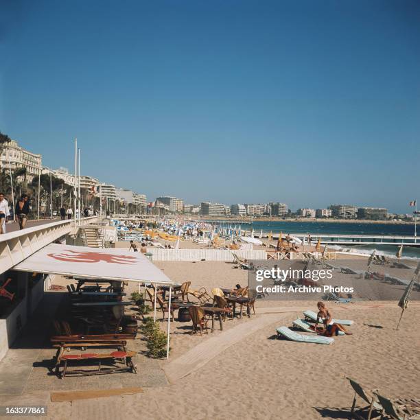 The beach at Cannes, France, circa 1970.