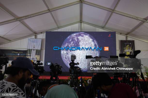 Members of the media report the successful landing of Chandrayaan-3 mission on the moon inside the ISRO Telemetry Tracking and Command Network...