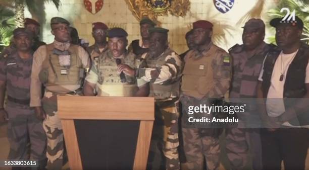 Screen grab captured from a video shows a group of senior Gabonese army officers appear on national television and announced that they had seized...
