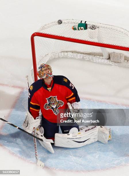 Goaltender Jacob Markstrom of the Florida Panthers looks up at the rebound of a shot by the Winnipeg Jets at the BB&T Center on March 8, 2013 in...