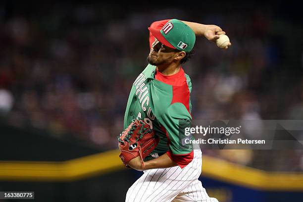 Yovani Gallardo#49 of Mexico throws a pitch against the United States during the World Baseball Classic First Round Group D game at Chase Field on...