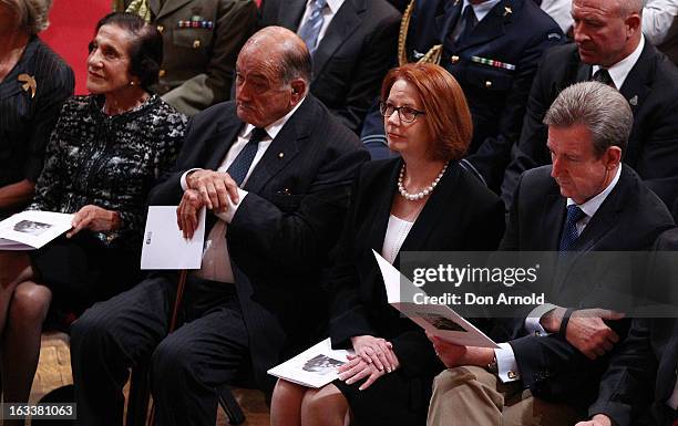 Marie Bashir, Sir Nicholas Shehadie, Julia Gillard and Barry O'Farrell are seen during the public memorial for Peter Harvey at Sydney Town Hall on...