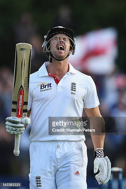 Nick Compton of England celebrates after scoring a century during day four of the First Test match between New Zealand and England at University Oval...