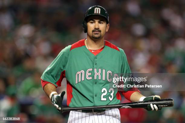 Adrian Gonzalez of Mexico reacts after he walked against the United States during the World Baseball Classic First Round Group D game at Chase Field...