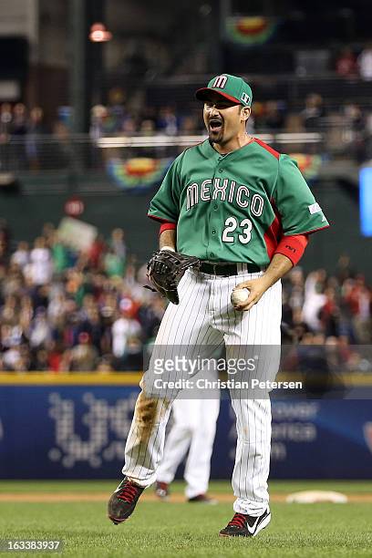 Adrian Gonzalez of Mexico celebrates after Mexico won 5-2 against the United States during the World Baseball Classic First Round Group D game at...