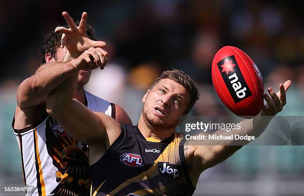Ricky Petterd of the Richmond Tigers marks the ball during the round three NAB Cup AFL match between the Hawthorn Hawks and the Richmond Tigers at...