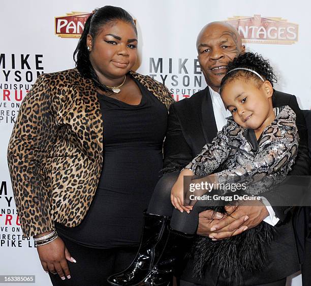 Mike Tyson and daughters Mikey Tyson and Milan Tyson arrive at the Los Angeles opening night of "Mike Tyson - Undisputed Truth" at the Pantages...