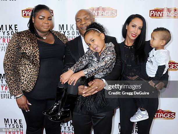 Mike Tyson , daughters Mikey Tyson, Milan Tyson, wife Kiki Tyson and son Morocco Tyson arrive at the Los Angeles opening night of "Mike Tyson -...