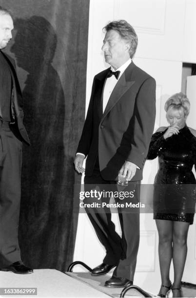 Garth Brooks, Dustin Hoffman, and Sandy Mahl attend the 12th annual American Cinematheque Moving Picture Ball at the Beverly Hilton Hotel in Beverly...