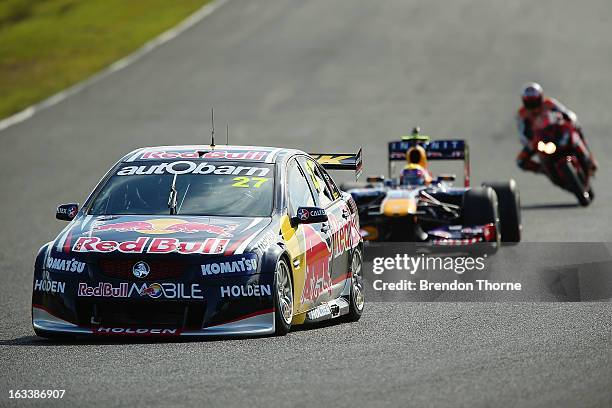 Jamie Whincup of Red Bull Racing Australia Holden, Mark Webber of Australia and Infiniti Red Bull Racing and Casey Stoner of Red Bull Pirtek Holden...