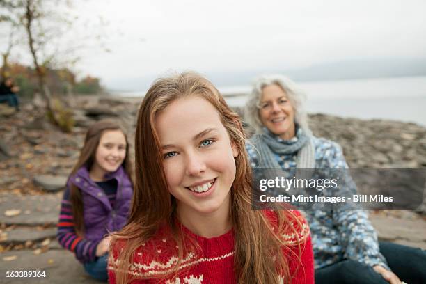 a day out at ashokan lake. three people, a woman and two girls.  - ashokan reservoir stock pictures, royalty-free photos & images