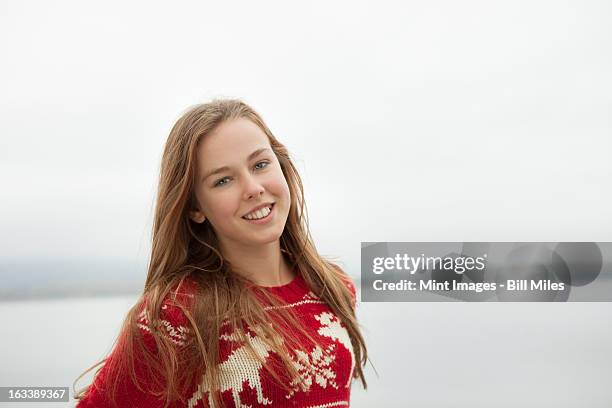 a day out at ashokan lake. a young girl in a red winter knitted jumper. - ashokan reservoir stock pictures, royalty-free photos & images