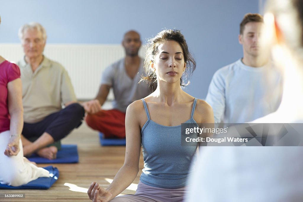 Individual within meditation class