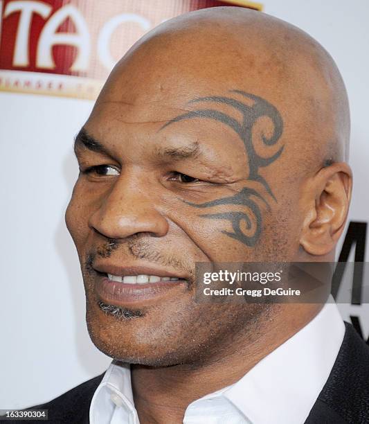 Mike Tyson arrives at the Los Angeles opening night of "Mike Tyson - Undisputed Truth" at the Pantages Theatre on March 8, 2013 in Hollywood,...