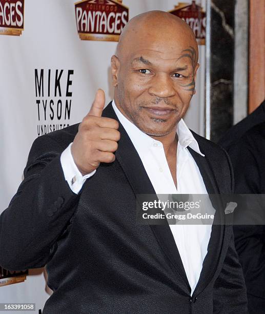 Mike Tyson arrives at the Los Angeles opening night of "Mike Tyson - Undisputed Truth" at the Pantages Theatre on March 8, 2013 in Hollywood,...