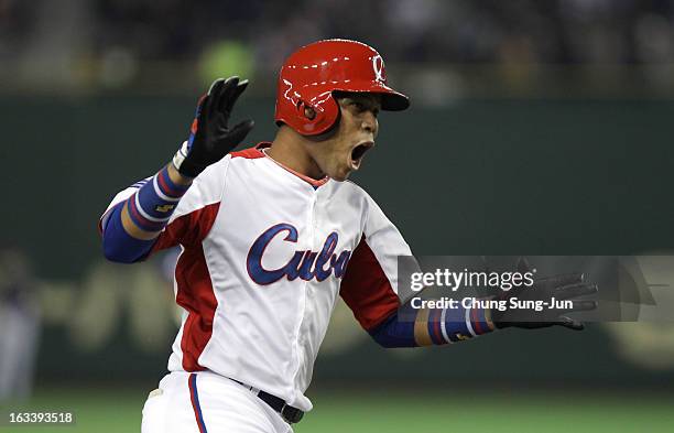 Jose Fernandez of Cuba celebrates after Frederich Cepeda's two run home run bottom in the first inning during the World Baseball Classic Second Round...