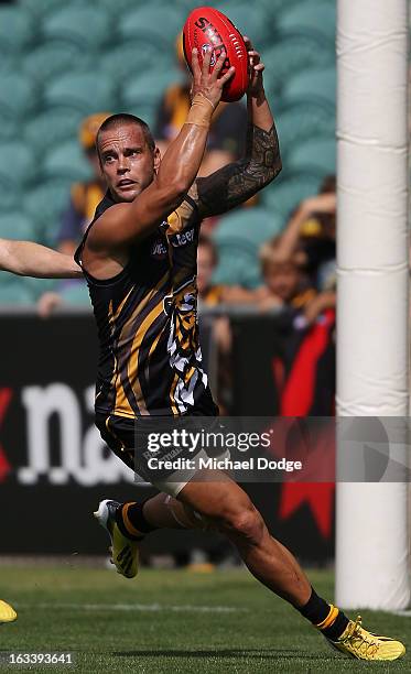 Jake King of the Richmond Tigers runs with the ball during the round three NAB Cup AFL match between the Hawthorn Hawks and the Richmond Tigers at...