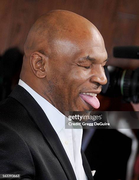 Mike Tyson arrives at the Los Angeles opening night of "Mike Tyson - Undisputed Truth" at the Pantages Theatre on March 8, 2013 in Hollywood,...