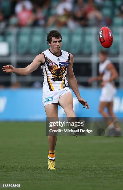 Isaac Smith of the Hawthorn Hawks kicks the ball during the round three NAB Cup AFL match between the Hawthorn Hawks and the Richmond Tigers at...