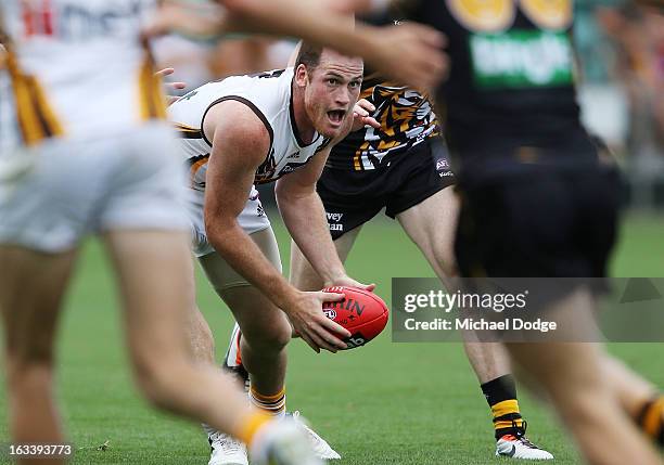 Jarryd Roughead of the Hawthorn Hawks looks ahaead with the ball during the round three NAB Cup AFL match between the Hawthorn Hawks and the Richmond...