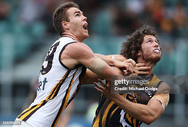 Max Bailey of the Hawthorn Hawks contests for the ball against Ty Vickery of the Richmond Tigers during the round three NAB Cup AFL match between the...